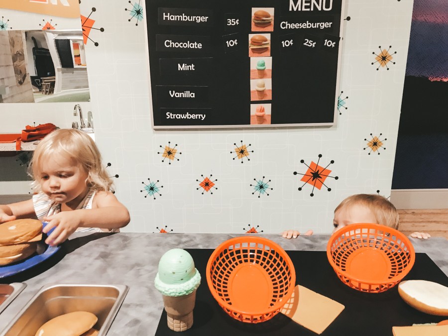 a picture of 2 kids playing in the diner at Kidscape at Johnson County Arts and Heritage Museum